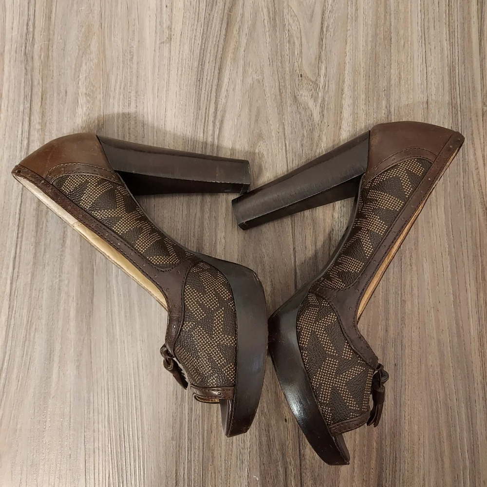Michael kors monogrammed peep toe tassle heels